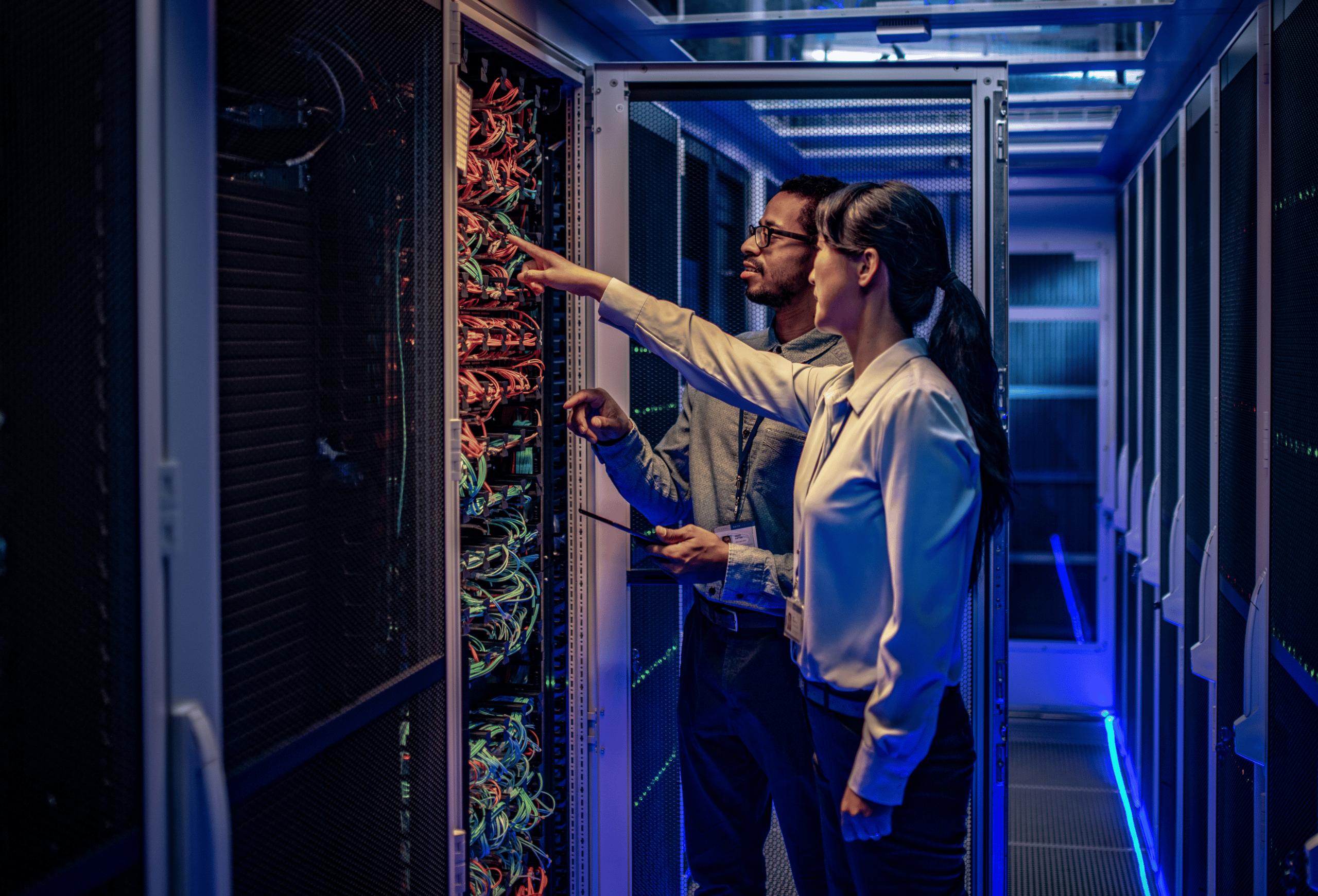 IT professionals monitoring network infrastructure as part of a managed cybersecurity strategy.
